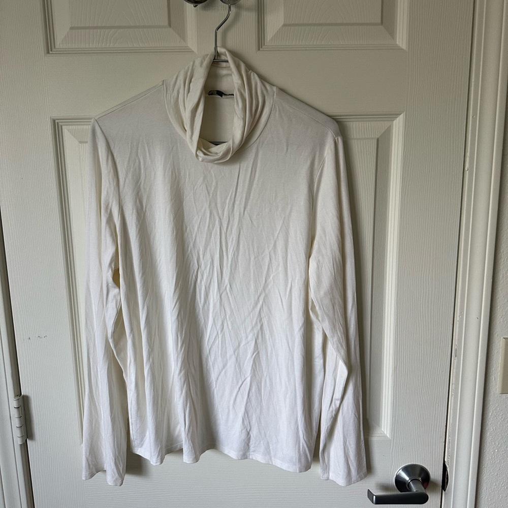 EILEEN FISHER Cream Turtleneck with ruching on the neck.